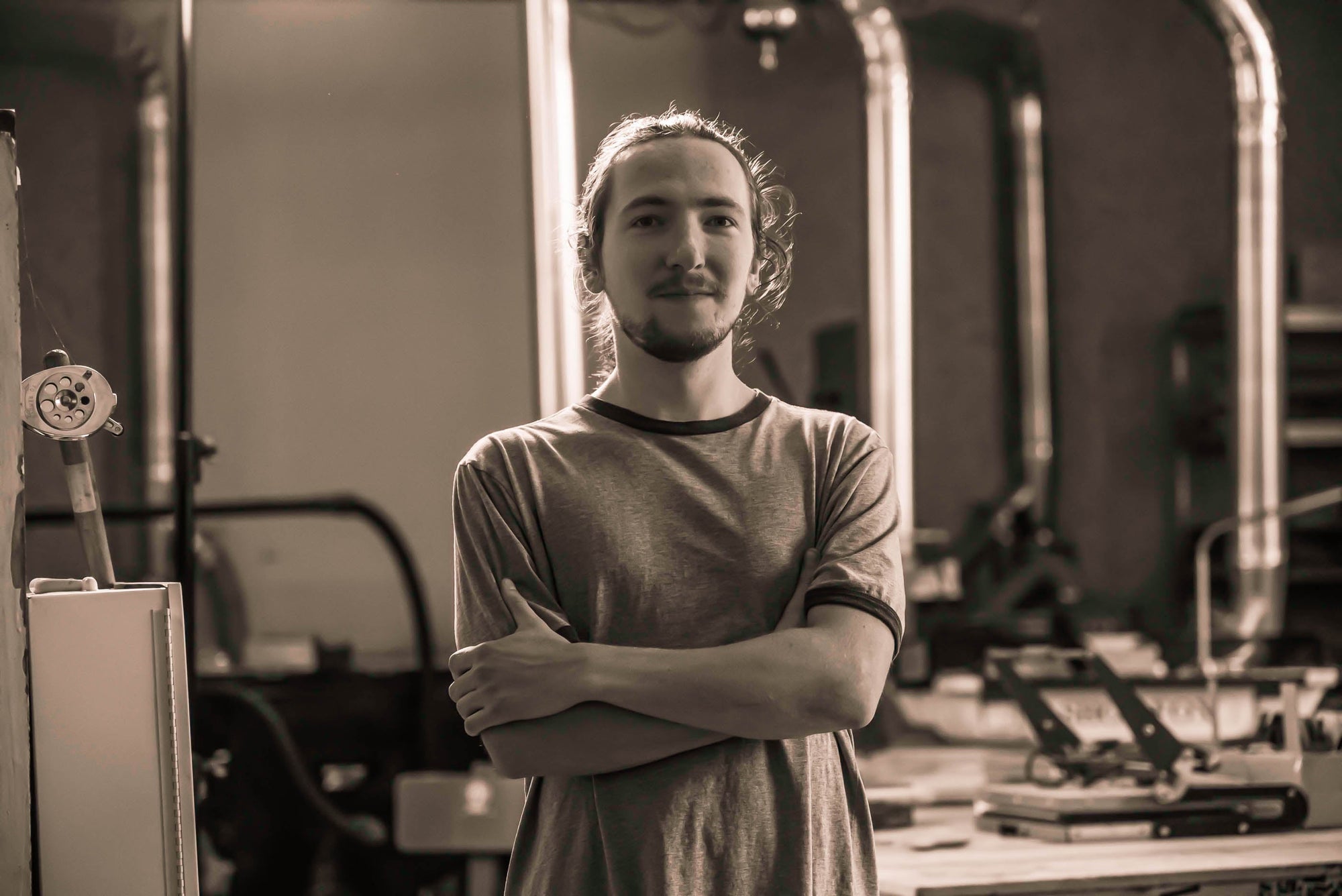 portrait photo of Jake Leya in the woodshop